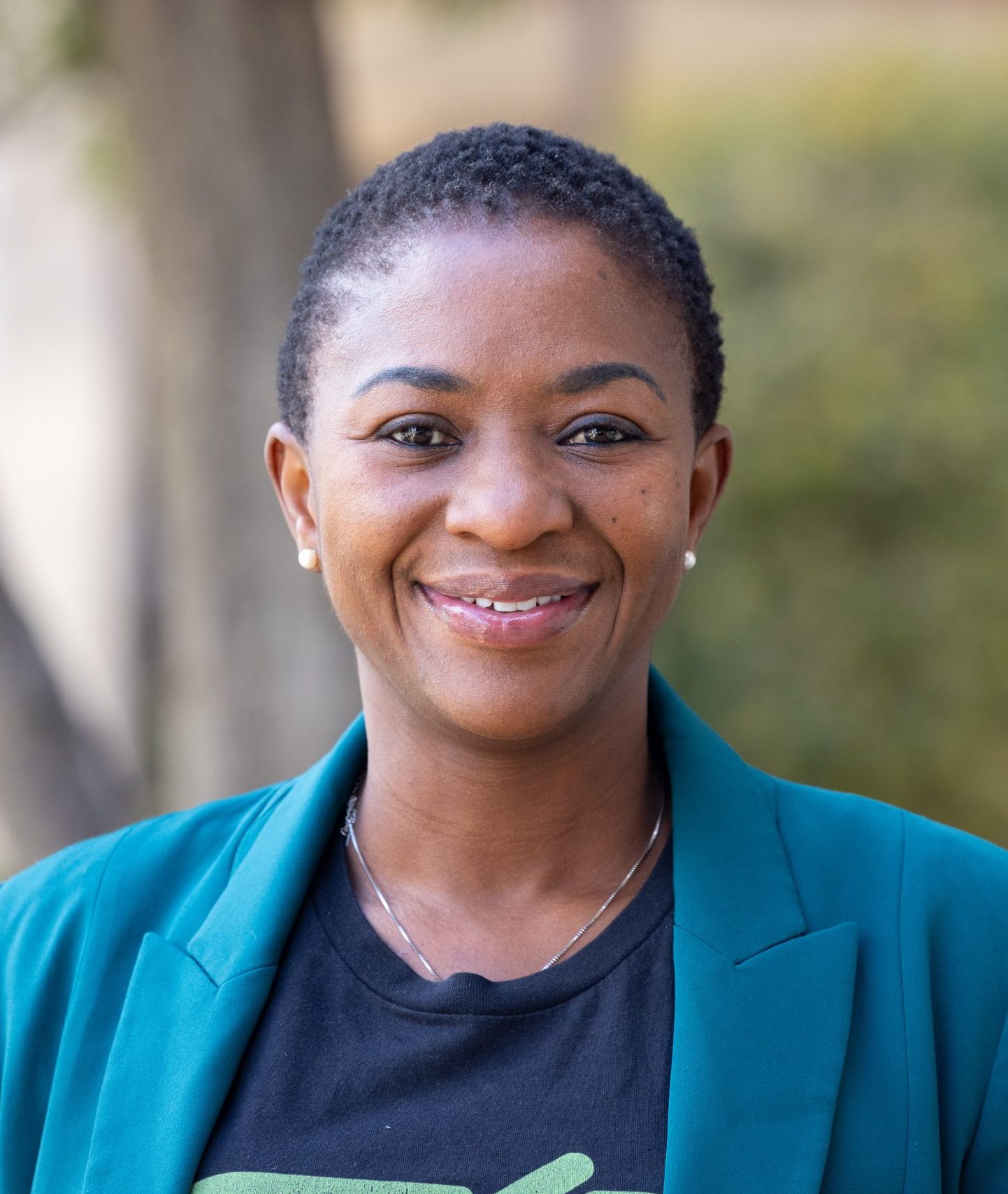 Michell Zulu, PharmD, Chief Operating Officer and Pharmacist